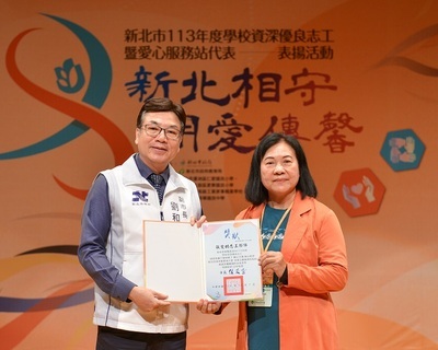 113年學校資深優良志工-張菊
